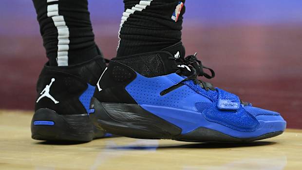 View of blue and black Zion shoes.